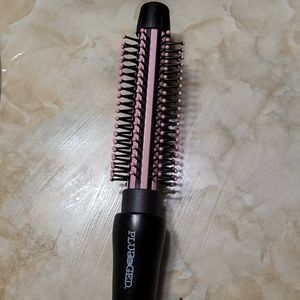 Plugged In curling brush Iron